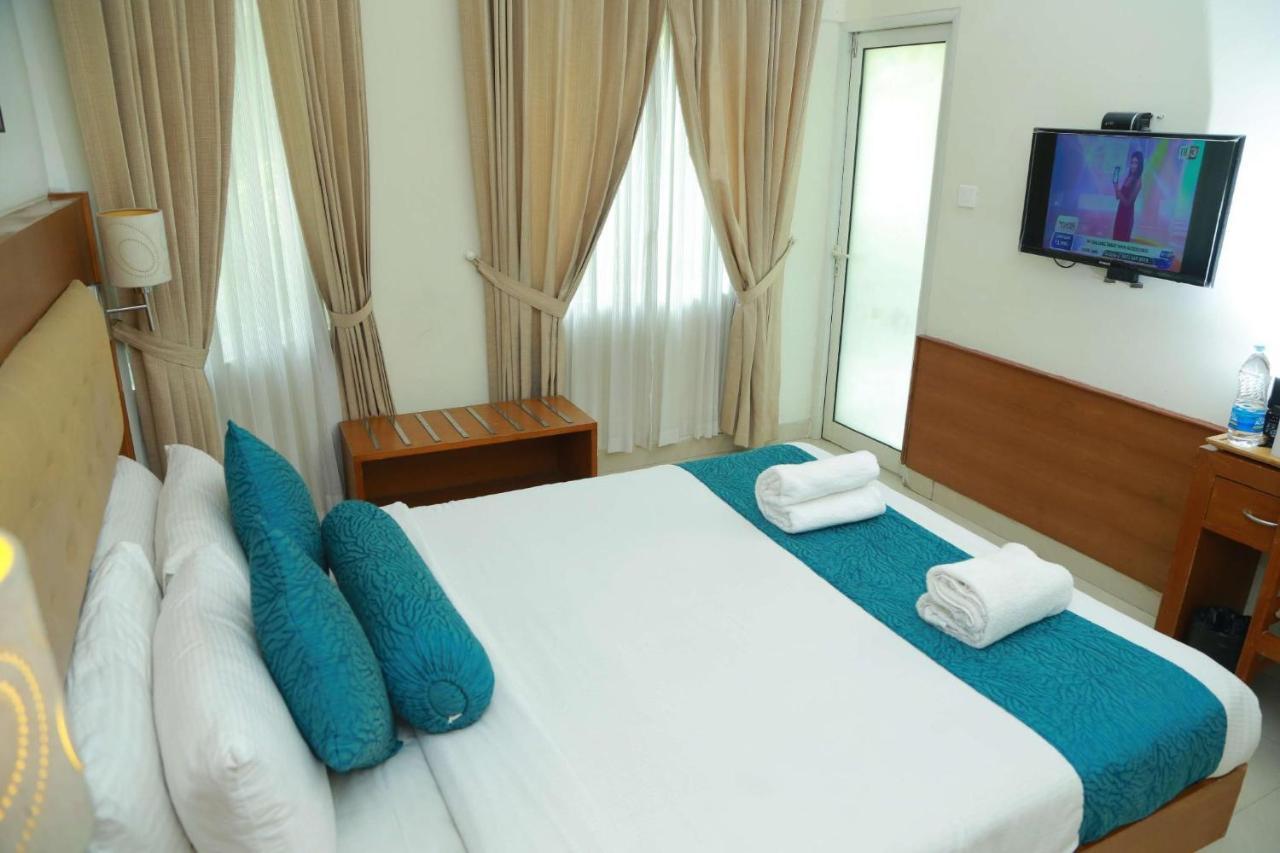 Vishnu Inn Гуруваюр Экстерьер фото